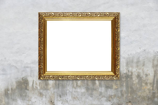 istock Antique golden picture photo frame on grey wall 1063309198