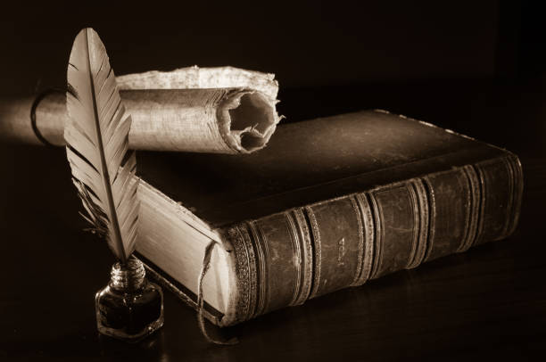 istock Quill pen and old books 1063311014