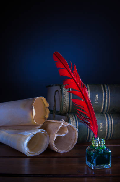 istock Quill pen and old books 1063311912
