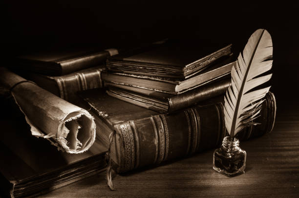 istock Quill pen and old books 1063312130