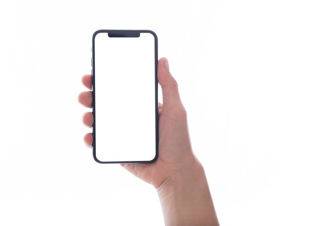 istock close up hand hold phone isolated on white, mock-up smartphone white color blank screen 1063313678