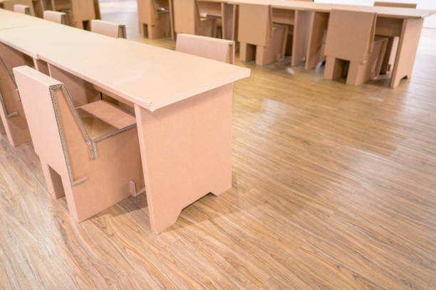 Tables and chairs made from recycled cardboard. stock photo