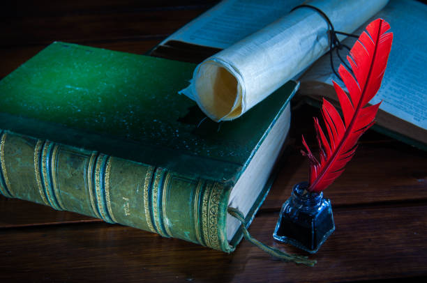 istock Quill pen and old books 1063315008