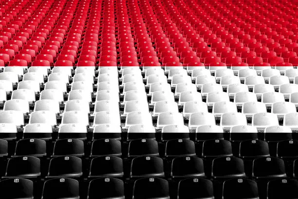 Photo of Yemen flag stadium seats. Sports competition concept.