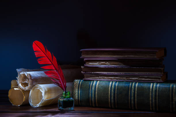 istock Quill pen and old books 1063317900