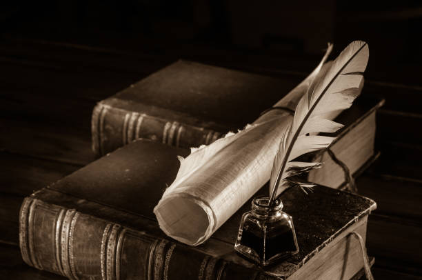istock Quill pen and old books 1063318566