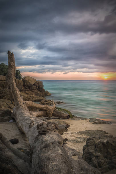 istock Amazing sunset seen from a beautiful beach in Phuket, Thailand. 1063322988