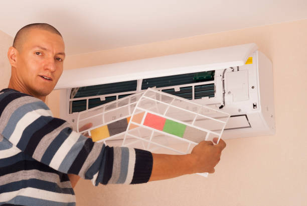 istock cleaning and repairs the air conditioner 1063329786