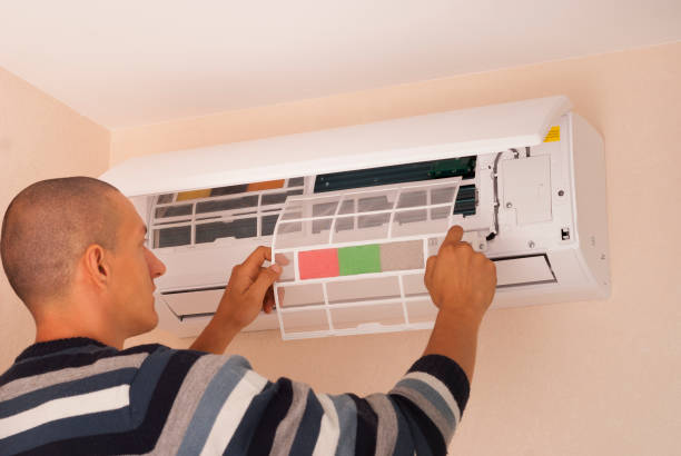 istock cleaning and repairs the air conditioner 1063329802