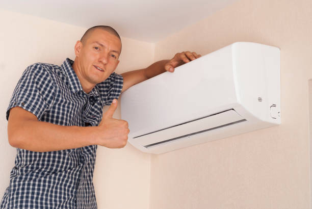 istock handyman and air conditioning 1063329818
