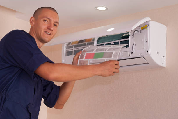 istock cleaning and repairs the air conditioner 1063329834