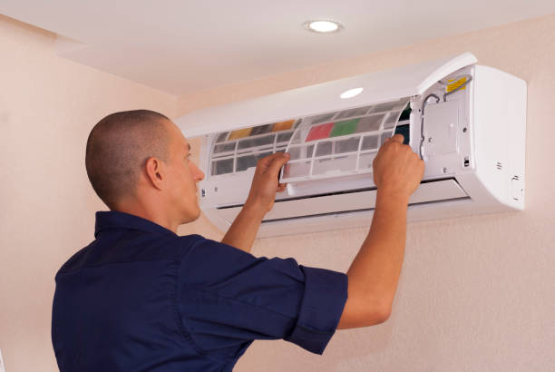 istock cleaning and repairs the air conditioner 1063329840