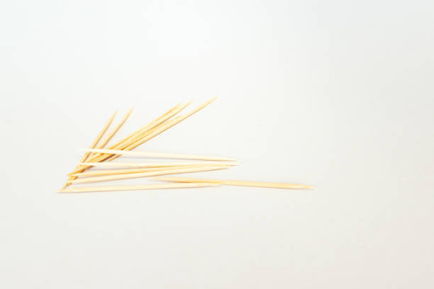 istock toothpick isolated, toothpick from bamboo on white background 1063332012
