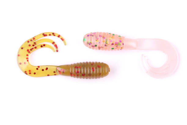 istock Fishing bait. Silicone twister in different colors 1063333048
