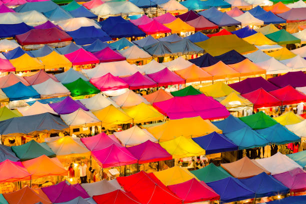 istock Multiple colour aerial view night flea market 1063341676
