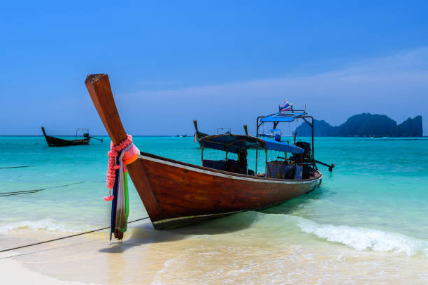 istock Long tail boats on tropical beach, Phi Phi Don island, Andaman s 1063341786