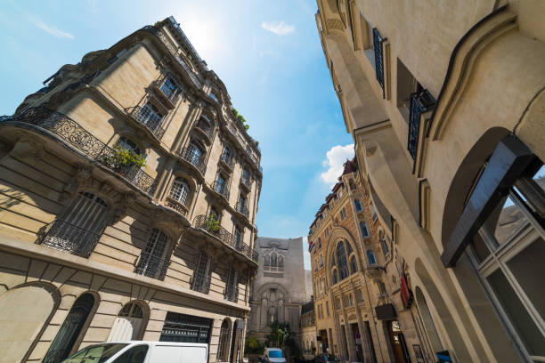 istock Elegant buildings under a shining sun in Paris 1063345396