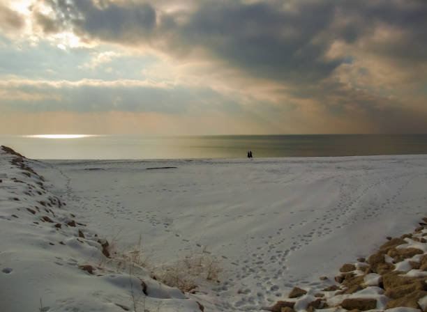 istock Lakeside in snowy winter 1063353292