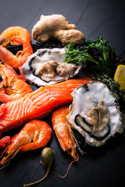 istock Fresh shrimp in the shell with salmon and lemon 1063357260