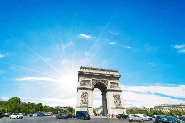 istock Sun shining over world famous Triumphal arch in Paris 1063365536