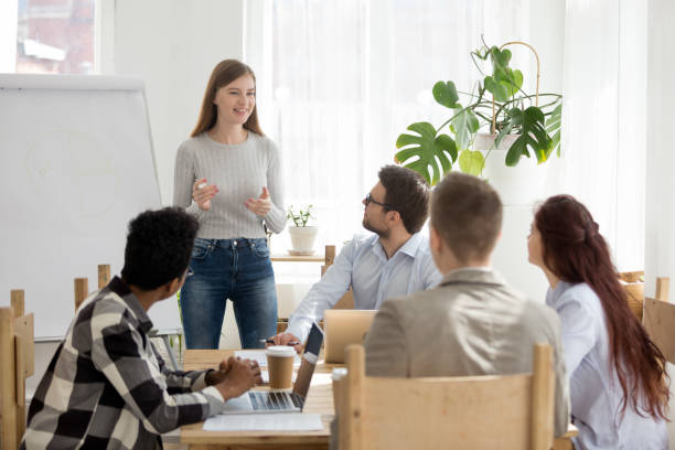 istock Young team at seminar in conference room 1063372278
