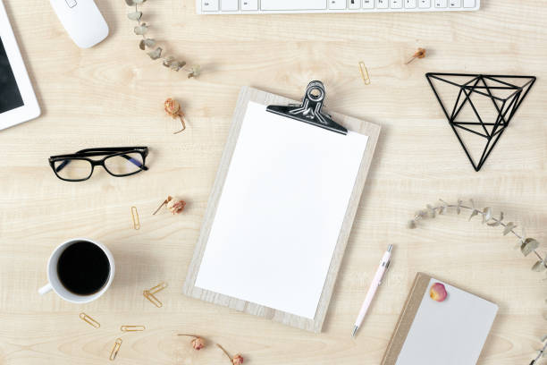 istock Feminine workspace lipboard and accessories top view 1063372486