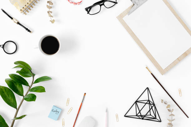istock Frame office accessories flat lay top view Office table desk feminine modern workspace 1063372816