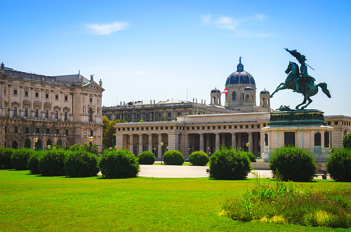 View of the Hofburg Palace and statue of Archduke Karl Ludwig on Heldenplatz square. Vienna, Austria.