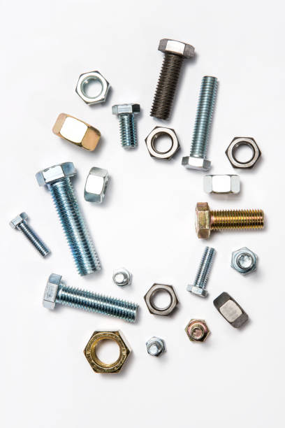 Bolt and Nut Bolt and Nut on a white background. nut fastener stock pictures, royalty-free photos & images