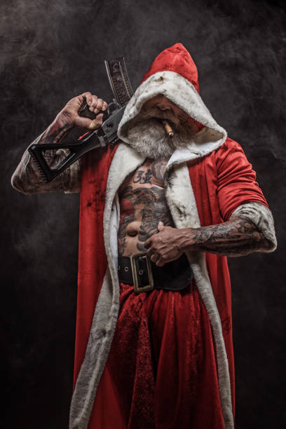 istock Bad Santa Claus with gun 1063385568