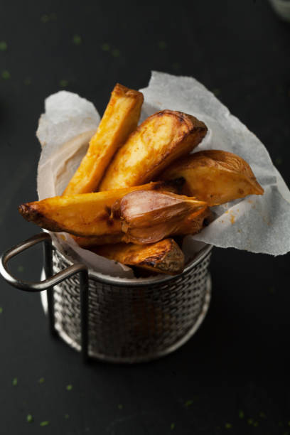 istock Delicious baked potato with garlic 1063387446