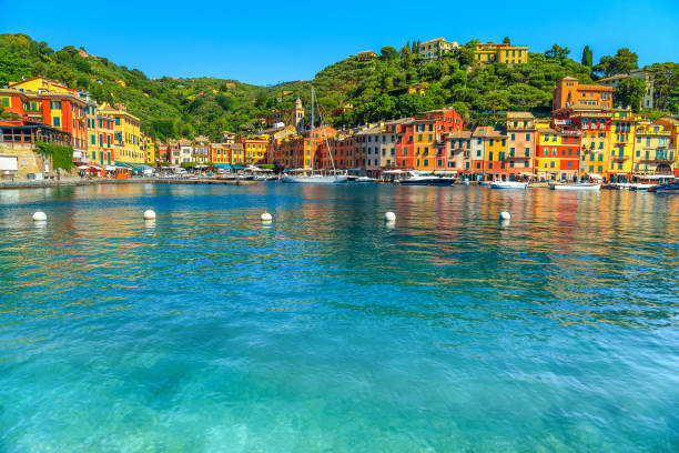 Breathtaking Portofino touristic resort with harbor, Cinque Terre, Italy, Europe Beautiful Portofino cityscape, best touristic Mediterranean place with typical colorful buildings and famous luxury harbor, Portofino, Liguria, Cinque Terre, Italy, Europe portofino photos stock pictures, royalty-free photos & images