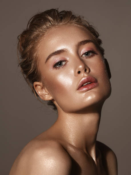 istock Beautiful woman with shiny make-up 1063394788