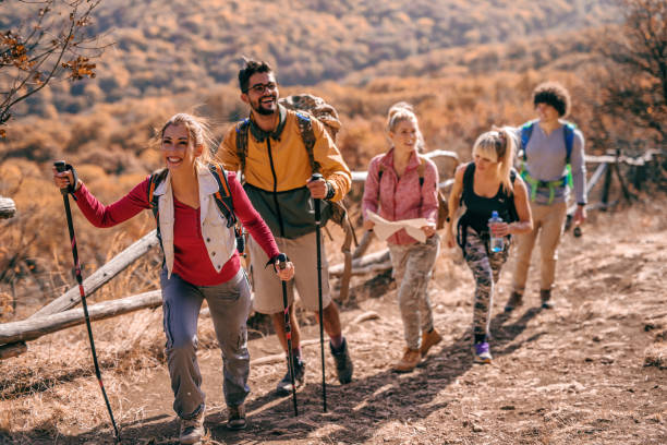 istock Hikers climbing the hill. 1063398586
