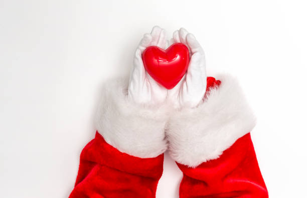 istock Santa holding a heart 1063400244