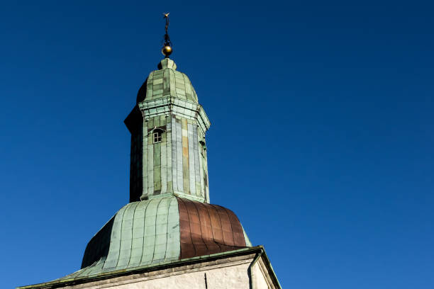 istock Bell tower and side elevation of a church 1063401144