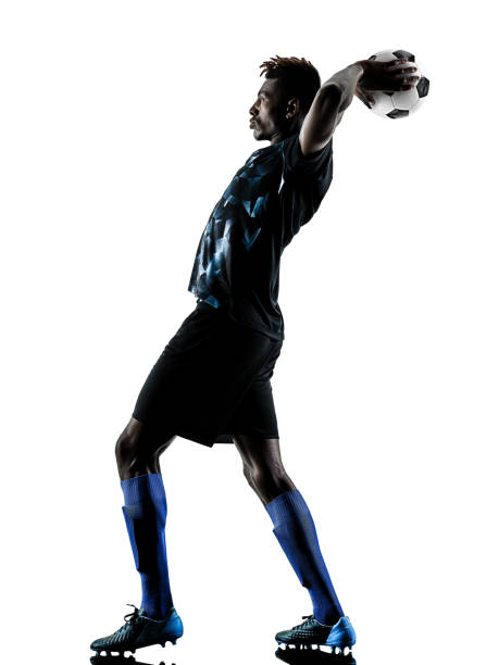istock one african soccer player man isolated white background silhouet 1063404452