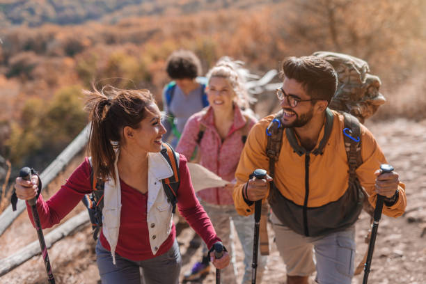 istock Hikers climbing the hill. 1063404522