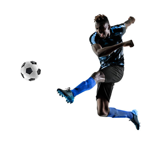 one african soccer player man playing in studio isolated on white background