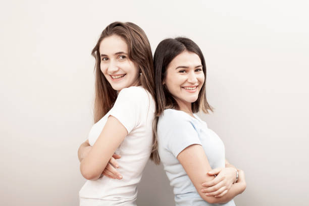 istock two woman talking in working place 1063419472