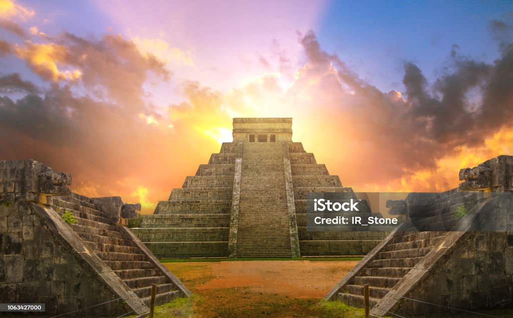 Mexico, Chichen Itzá, Yucatán. Mayan pyramid of Kukulcan El Castillo at sunset Mexico, Chichen Itza, Yucatan. Mayan pyramid of Kukulcan El Castillo Mayan Stock Photo