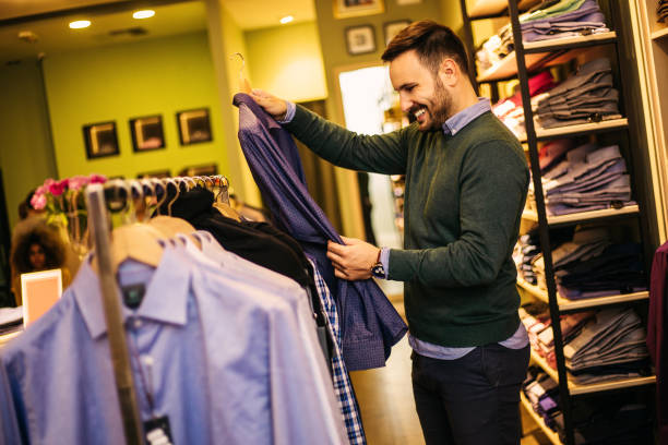istock Handsome male choosing the right shirt 1063427062
