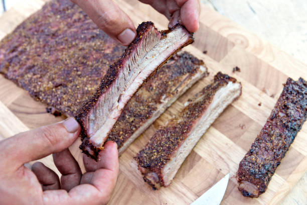 istock Cutting pork ribs on cutting board 1063431588