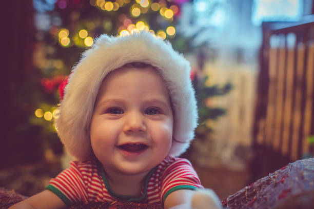 istock Cute boy near Christmas tree 1063432644