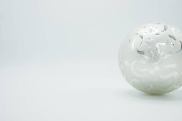istock White Christmas ball on white background. Left copy space. 1063440748