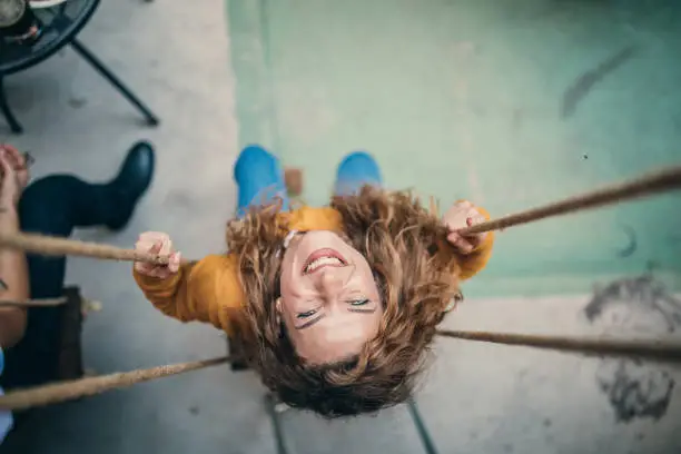 Woman swinging at the coffee shop