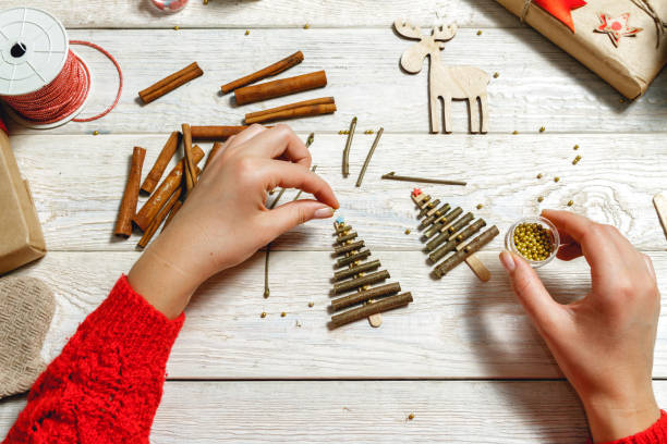 istock Woman creates a Christmas accessories 1063444382