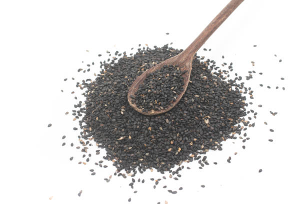 istock Pile of black sesame in a spoon 1063447078