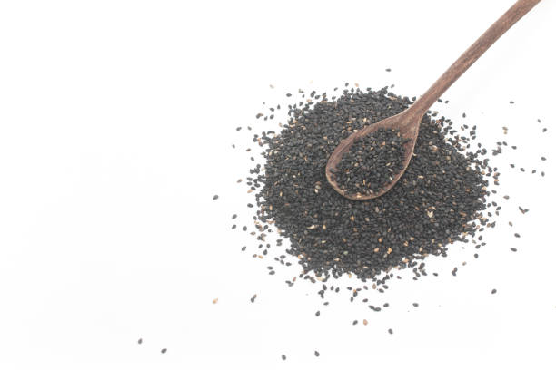 istock Pile of black sesame in a spoon 1063447132