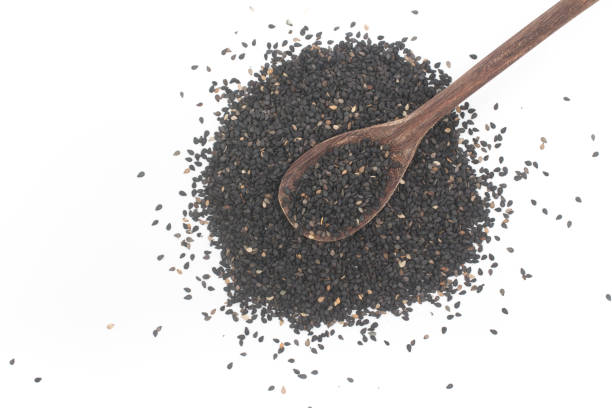istock Pile of black sesame in a spoon 1063448158